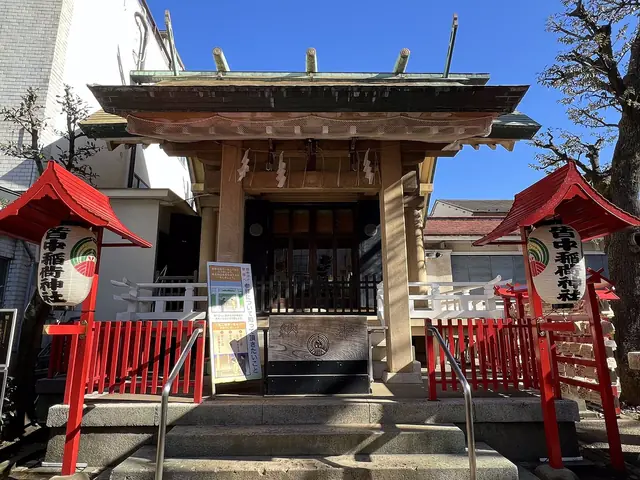 The small hall of worship of Kaichu Inari Shrine with red lanterns, near Shin-Okubo Station